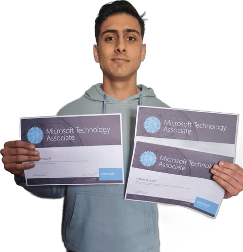 School of IT graduate holding his certificates